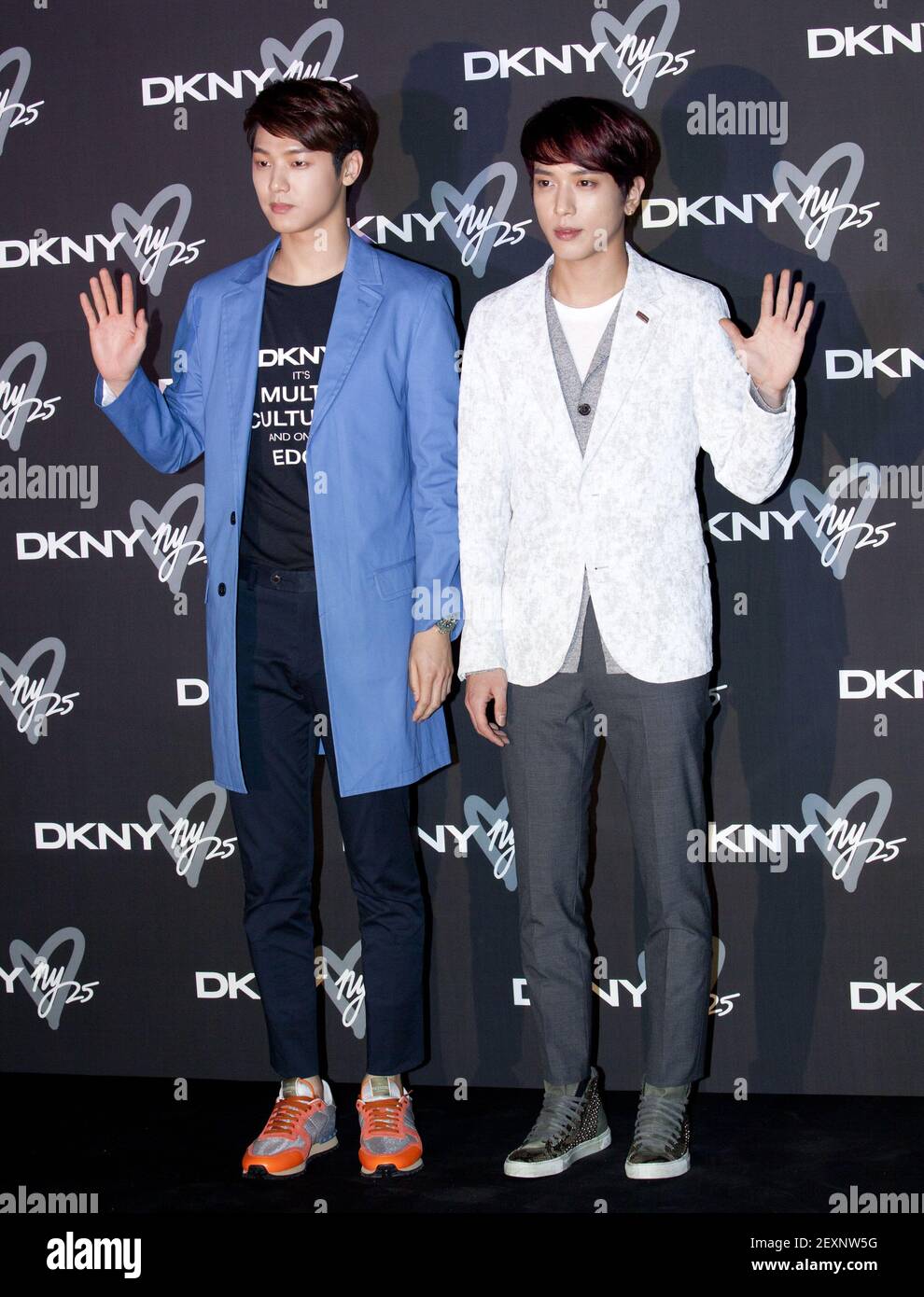 27 March 2014 - Seoul, South Korea : ( R to L) South Korean Jung Yong-Hwa  and Kang Min-Hyuk members of K-Pop boys band CN Blue, attend a photo call  for the, image size:990x1390