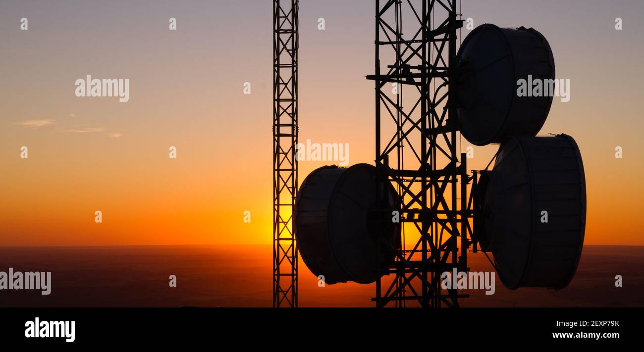 Cellular Radio Wave Communication Towers Evening Sunset Horizon Stock Photo