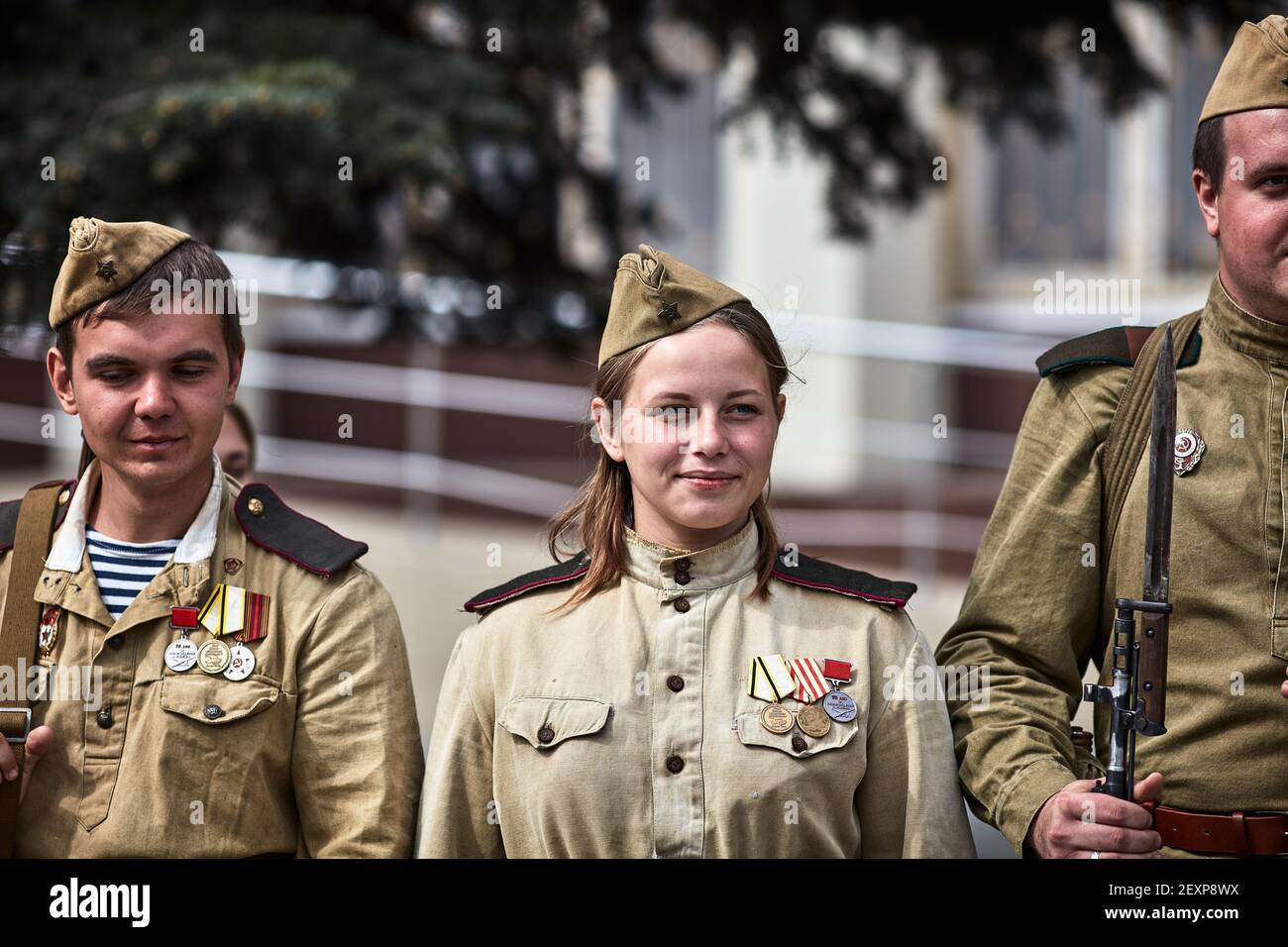 People in military uniform in honor of the Victory Day holiday. Military historical society, reconstruction of the appearance of fighters of the Secon Stock Photo