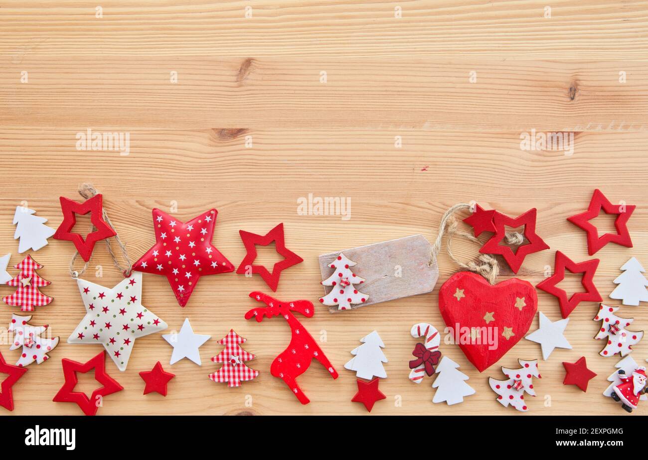 Wooden background with poinsettias Stock Photo