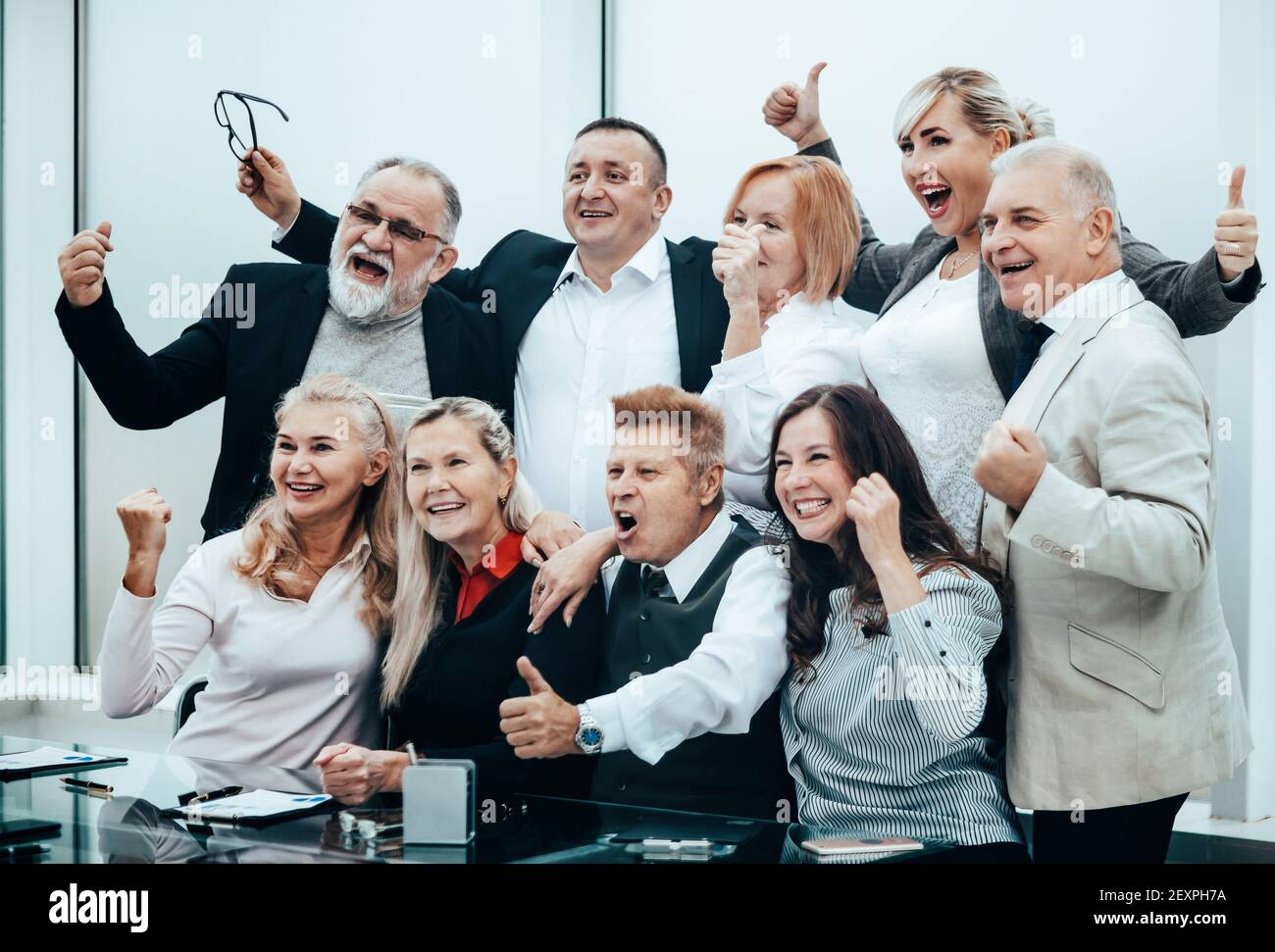 group of happy business people showing thumbs up Stock Photo - Alamy