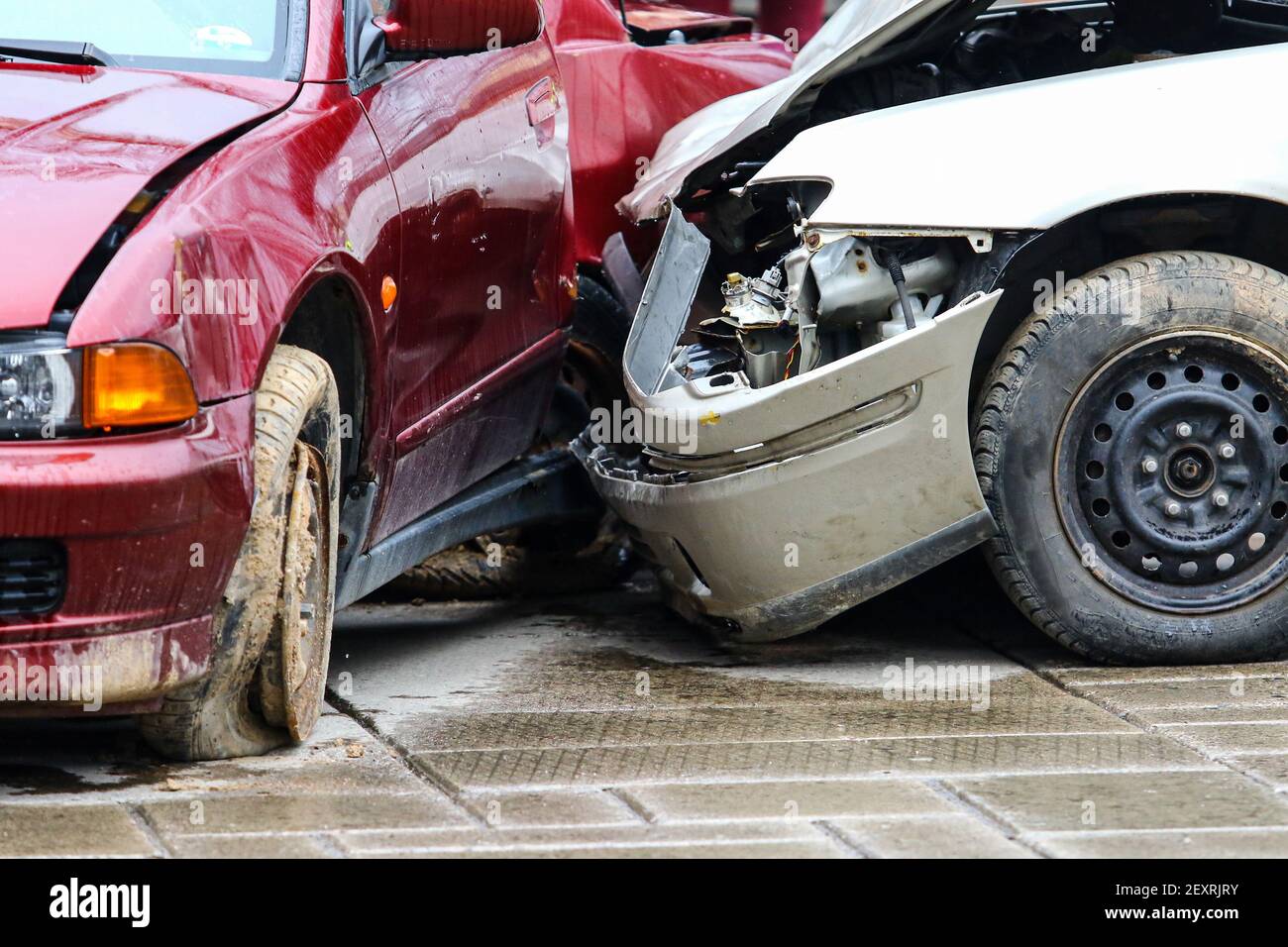Car accident in the street. Smashed auto after car collision Stock Photo
