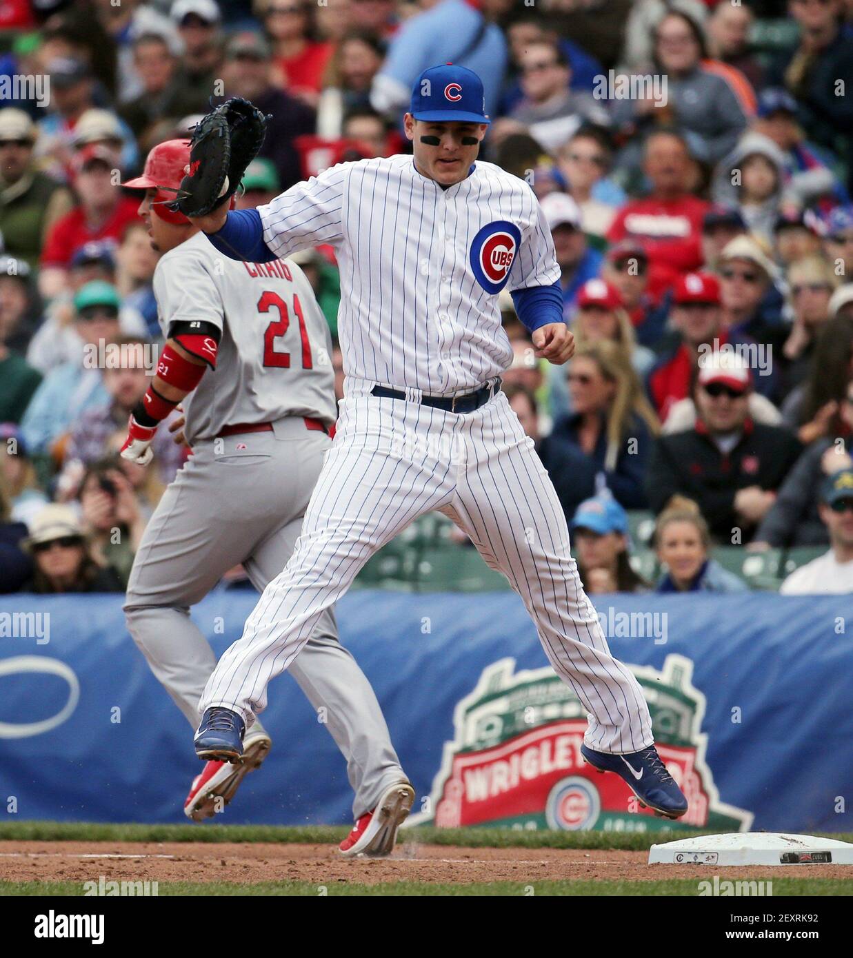 Chicago Cubs first baseman Anthony Rizzo jumps after retiring the St ...