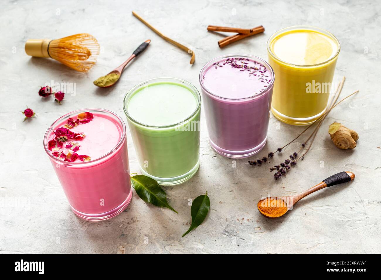 Colorful latte coffee or tea with blue spirulina turmeric and matcha