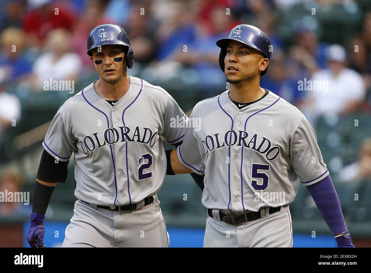 Colorado Rockies Troy Tulowitzki (2) and Carlos Gonzalez (5) celebrate  after scoring in the first inning against the Texas Rangers in Arlington,  Texas, on Wednesday May 7, 2014. (Photo by Ron Jenkins/Fort