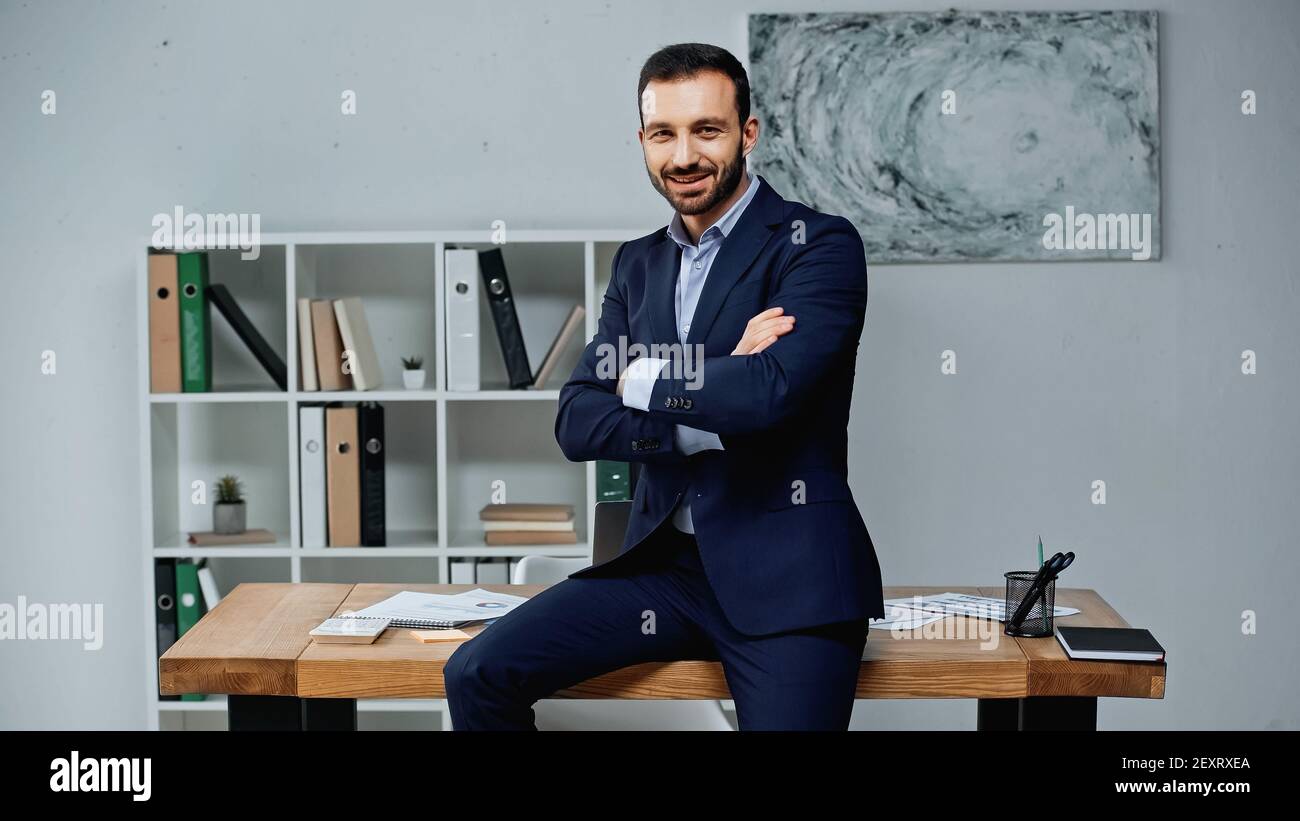 Happy smiling businessman with crossed arms pose hi-res stock ...