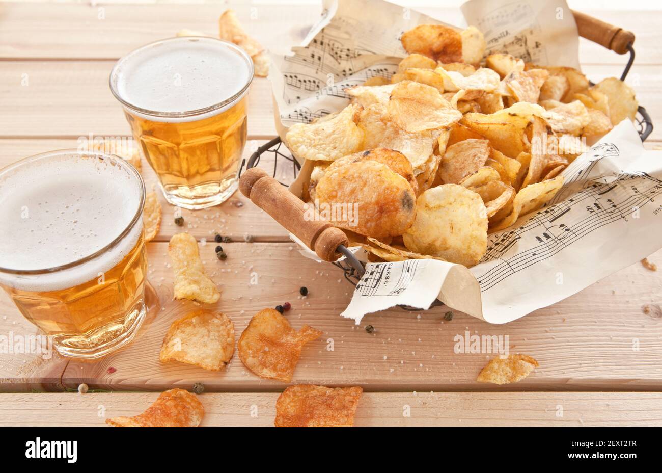 Vintage wire basket with chips Stock Photo Alamy