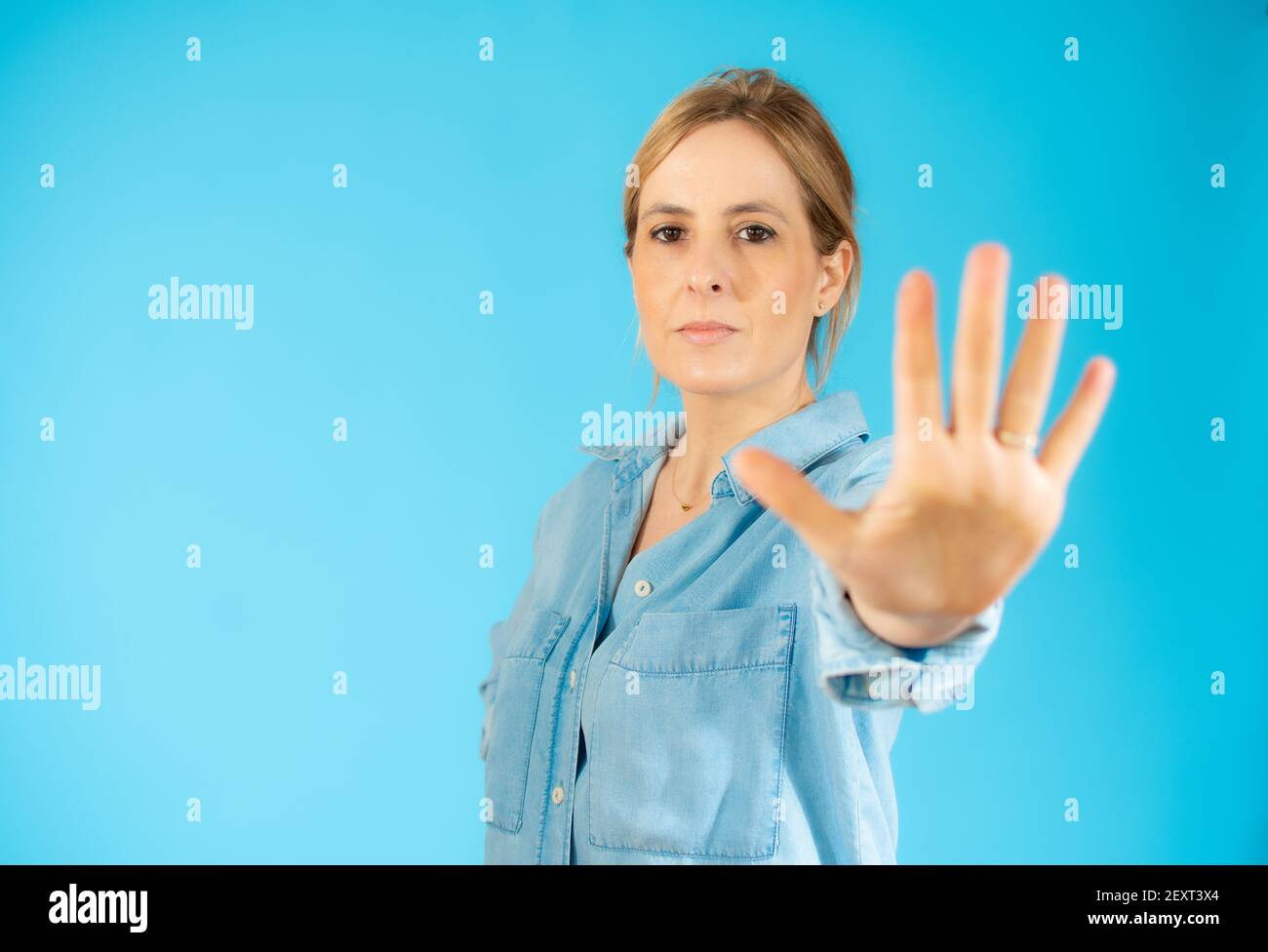 Woman young stop sign hi-res stock photography and images - Alamy