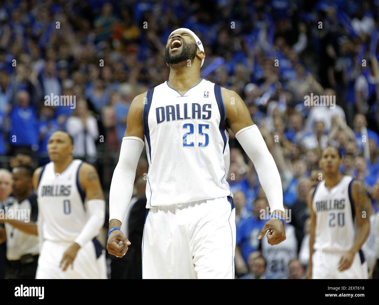 Dallas Mavericks guard Vince Carter (25) celebrates at the Mavericks took the lead against the San Antonio Spurs late in Game 6 of an NBA Western Conference quarterfinal at the American Airlines Center in Dallas, Friday, May 2, 2014. The Mavericks defeated the Spurs, 113-111. (Photo by Ron Jenkins/Fort Worth Star-Telegram/MCT/Sipa USA) Stock Photo