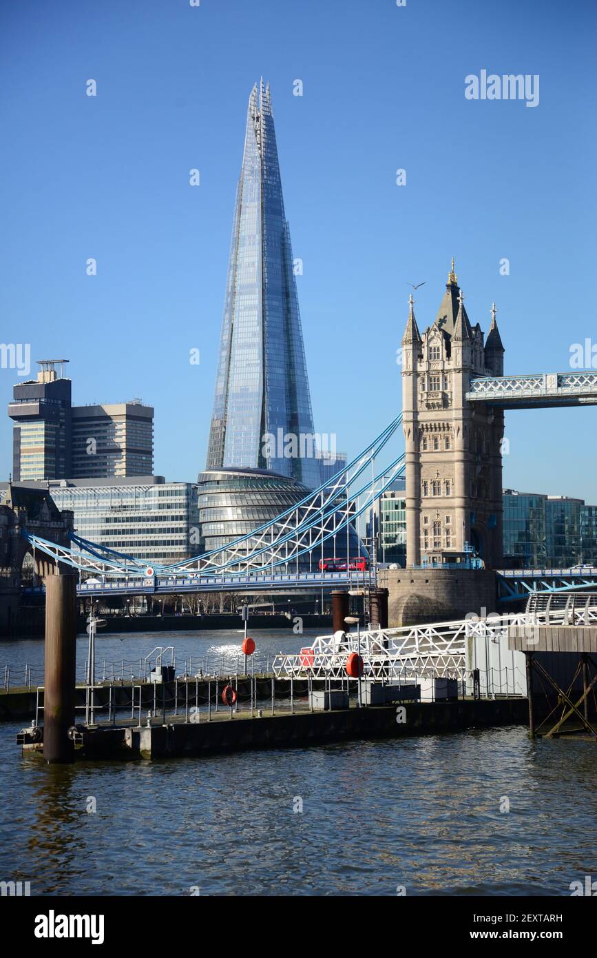 The Shard and Tower Bridge with the River Thames in the foreground, London, England Stock Photo