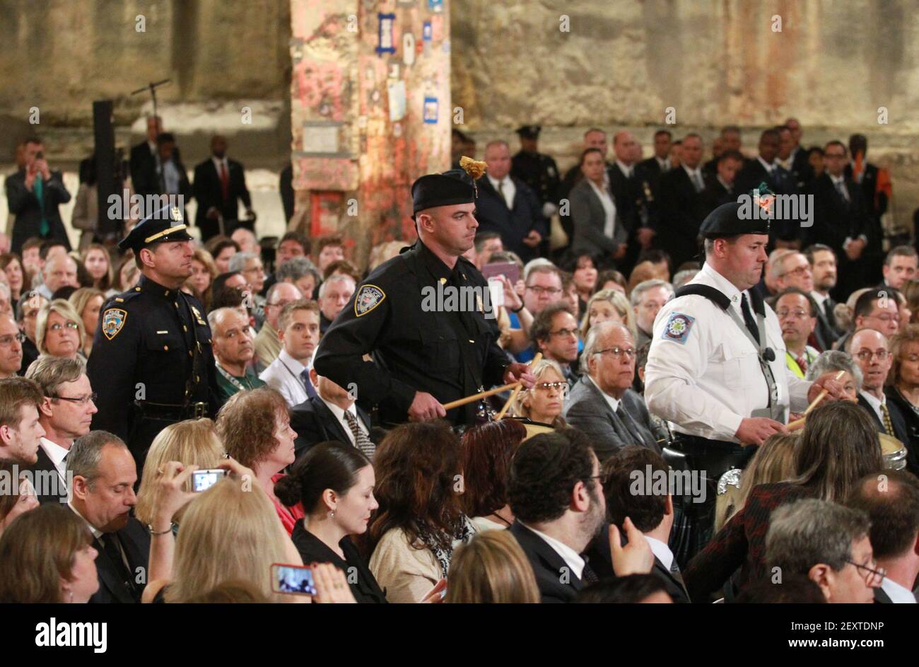 The honor guard comprised of members of the FDNY, NYPD, and PAPD arrive