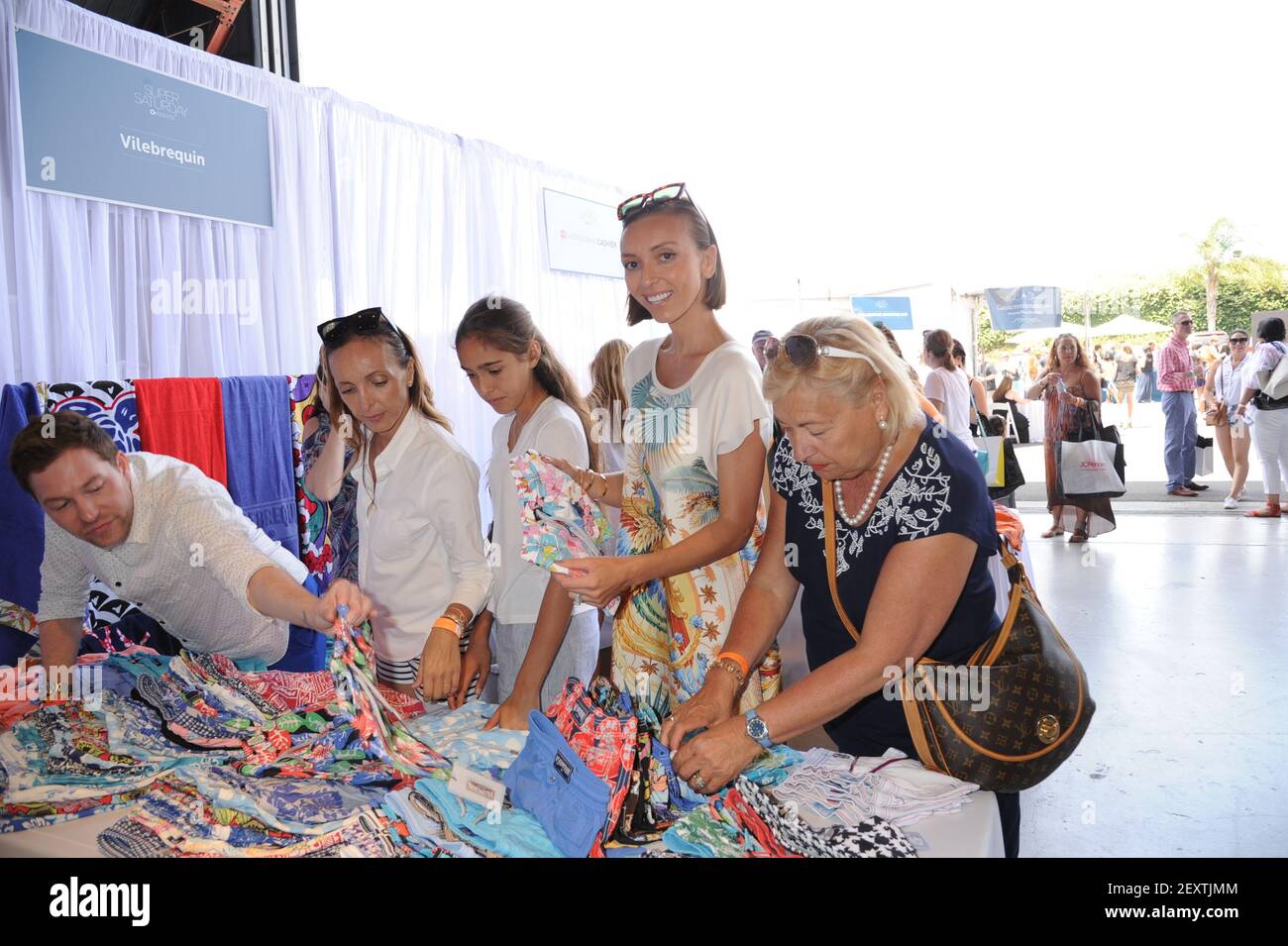 L R Monica DePandi, Giuliana Rancic, Mama DePandi attends Super