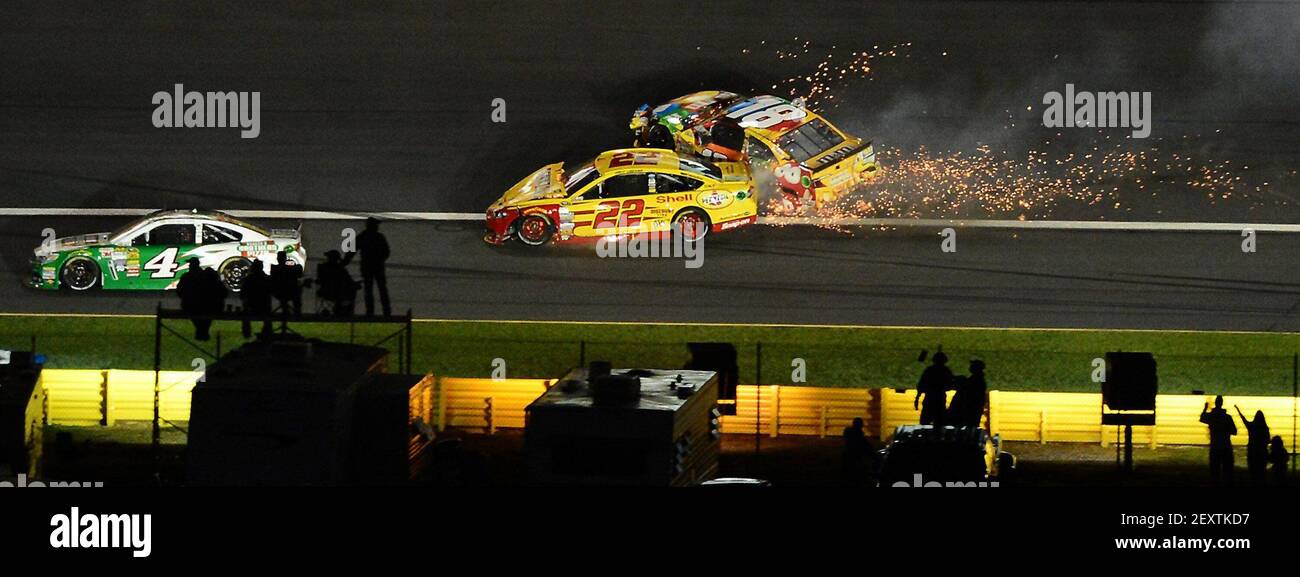 Nascar Sprint Cup Series Drivers Kyle Busch 18 And Joey Logano 22 Wreck In Turn 3 At Charlotte Motor Speedway During The Sprint All Star Race In Concord N C On Saturday May