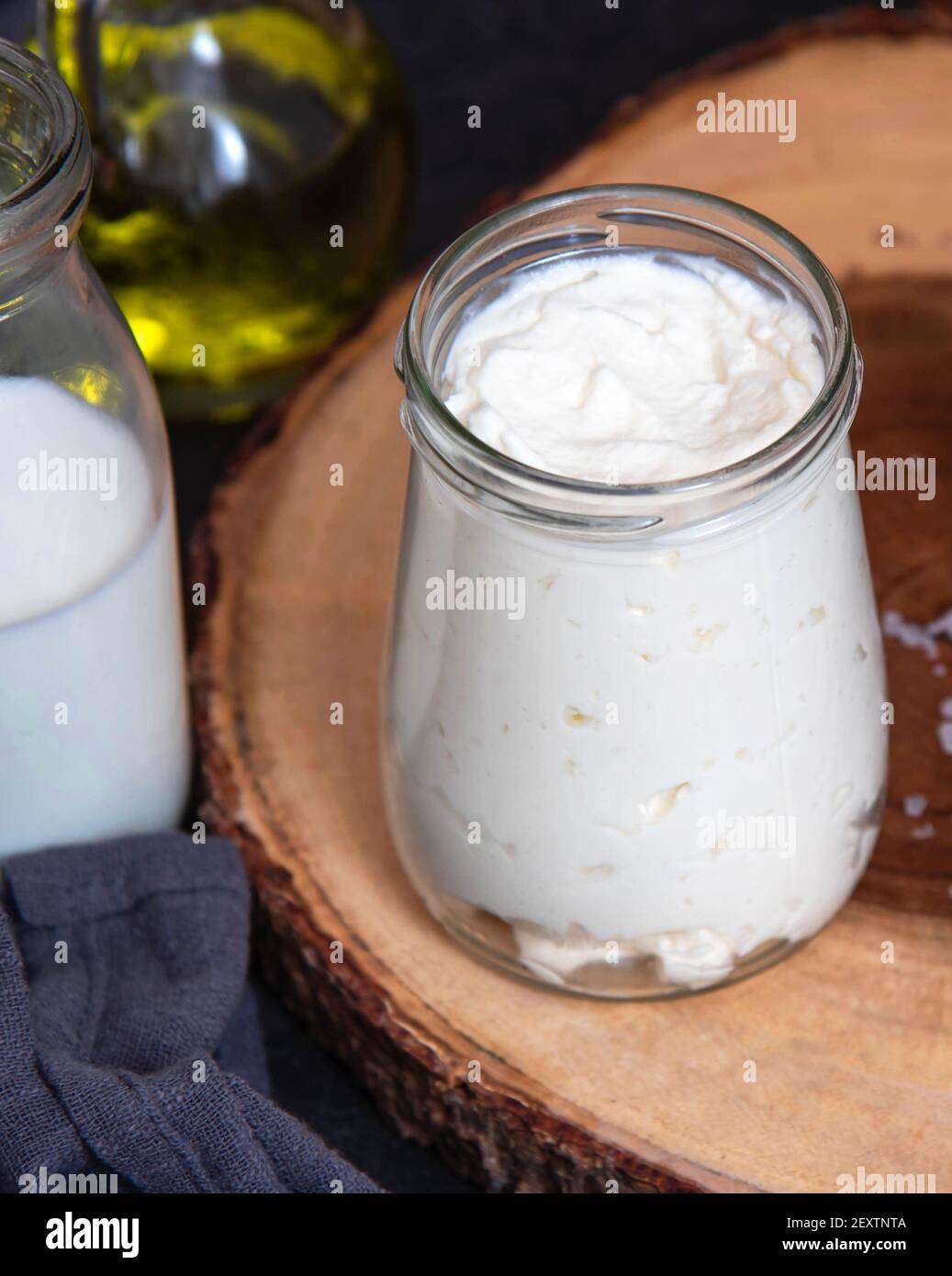 Vegetarian mayonnaise. Ingredients for mayonnaise oil, milk and mustard. Homemade mayonnaise