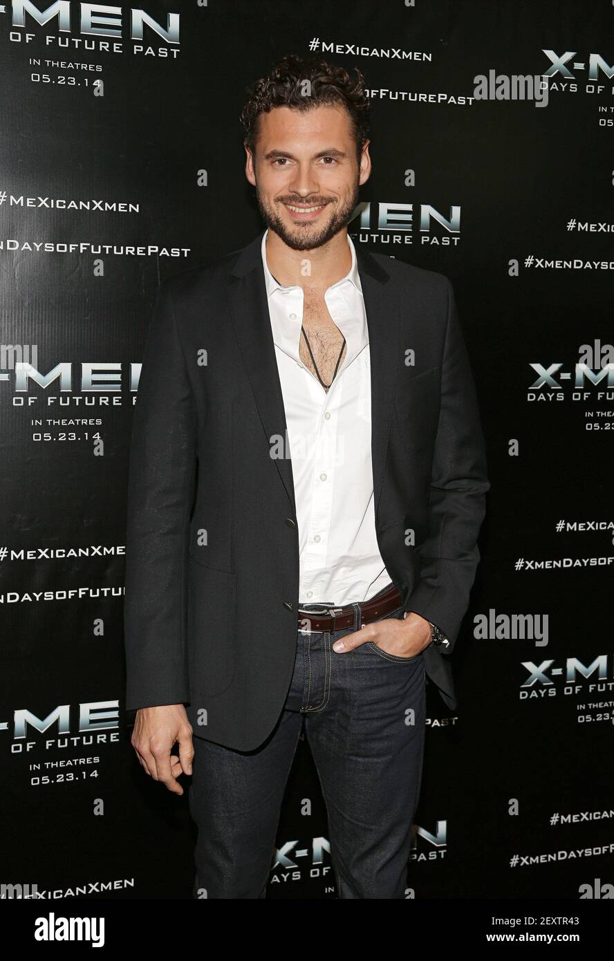Adan Canto attends the X-Men: Days of Future Past red Carpet at the