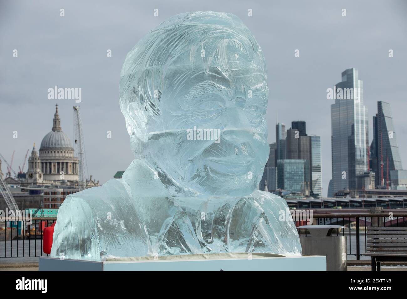 A giant ice sculpture of Sir David Attenborough stands along the Southbank to demonstrate the Arctic ice melt caused by one UK person EVERY FORTNIGHT Stock Photo