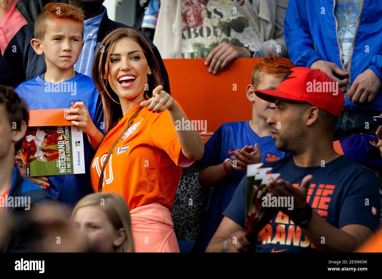 Rotterdam - May 31, 2014 - - Yolanthe Sneijder-Cabau with the son of Wesley  Sneijder in the stands during the wedtrsijd Nedelands team against Ghana  uitzwaaiwedstrijd for the World Cup football in