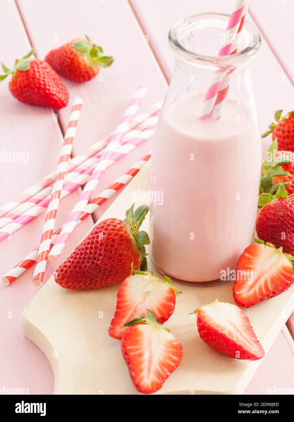 Milk with fresh strawberries Stock Photo