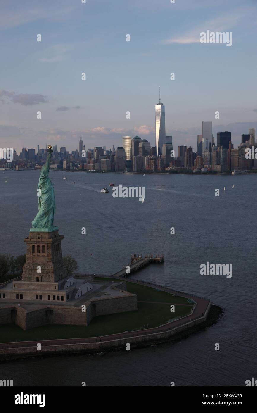 Aerial view of the statue of Liberty and the skyline in New York City ...