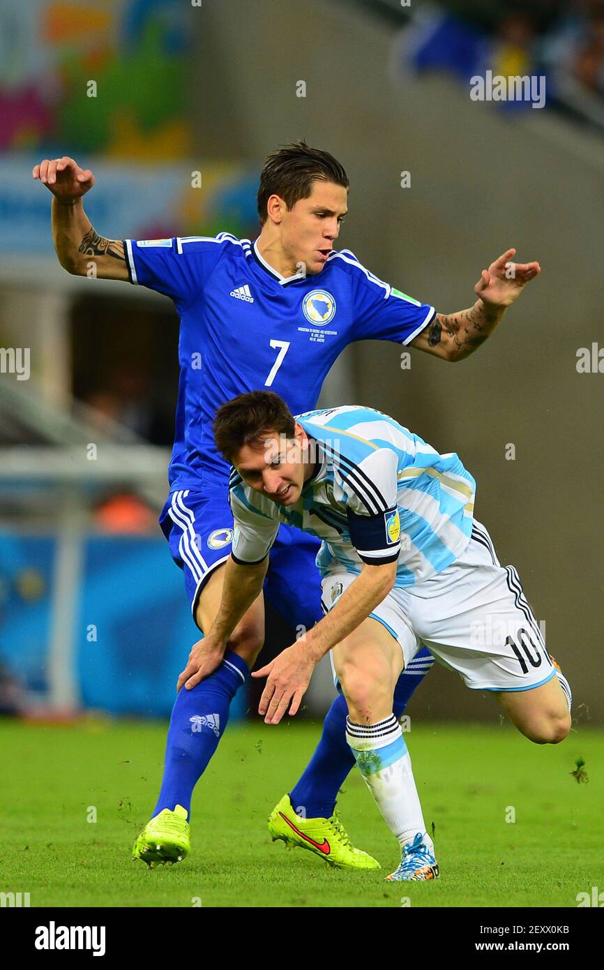 Bosnia-Herzegovina's Muhamed Besic (L) vies with Argentine's LIONEL MESSI (R) during the group F 2014 FIFA World Cup soccer match between Argentina and Bosnia-Herzegovina, in Maracana Stadium in Rio de Janeiro, Brazil, on June 15, 2014. Photo by Adrian Macias/MEXSPORT/Fotoarena/Sipa USA Stock Photo