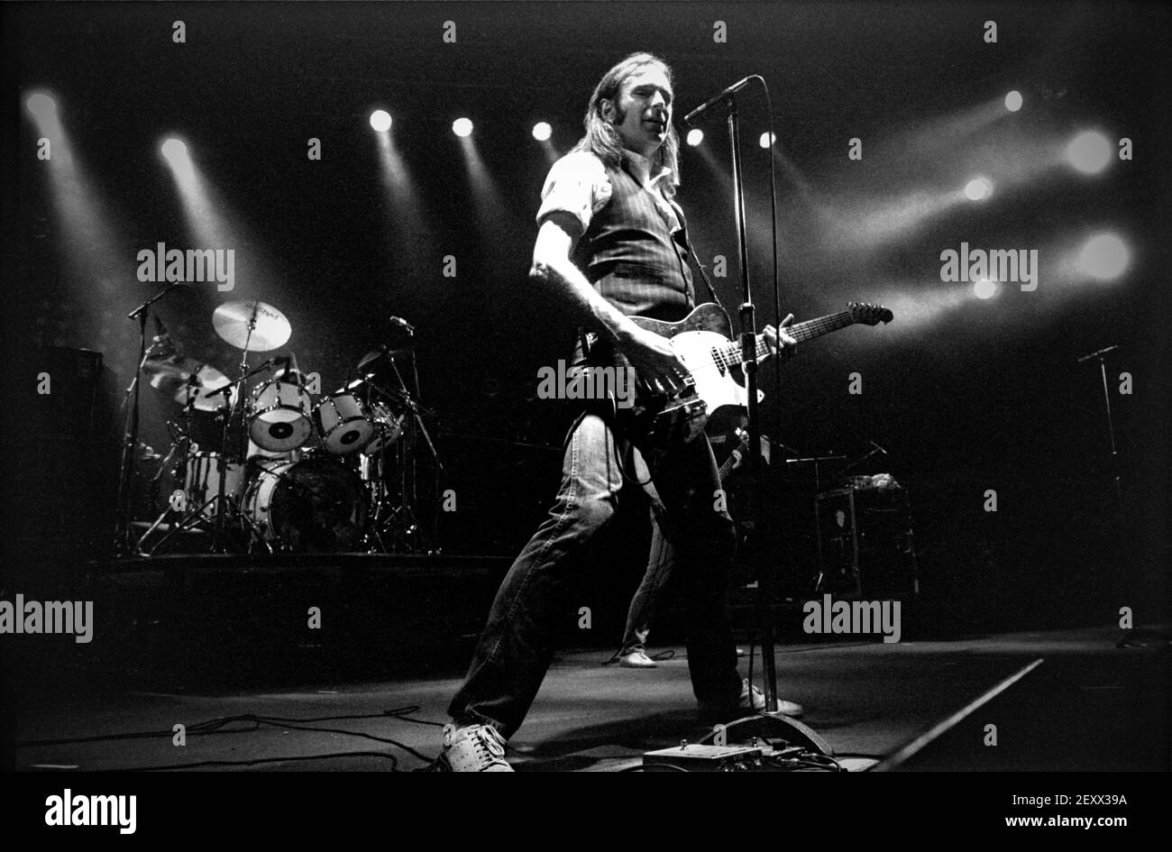 ZWOLLE, THE NETHERLANDS - 08 MAY, 1984: Status Quo live on stage during a concert in The Netherlands. Stock Photo