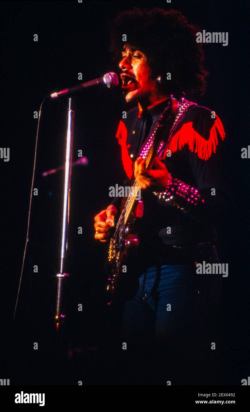 NIJMEGEN, THE NETHERLANDS - 13 FEB, 1981 : Thin Lizzy starring bass player Phil Lynott live on stage during a concert in The Netherlands. Stock Photo