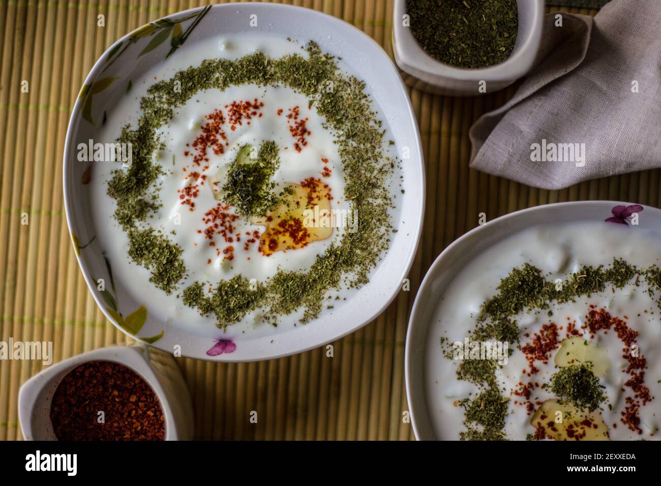 cacık is made with yoghurt, garlic, cucumber and mint. Both appetizers and meals are eaten like salads, Stock Photo