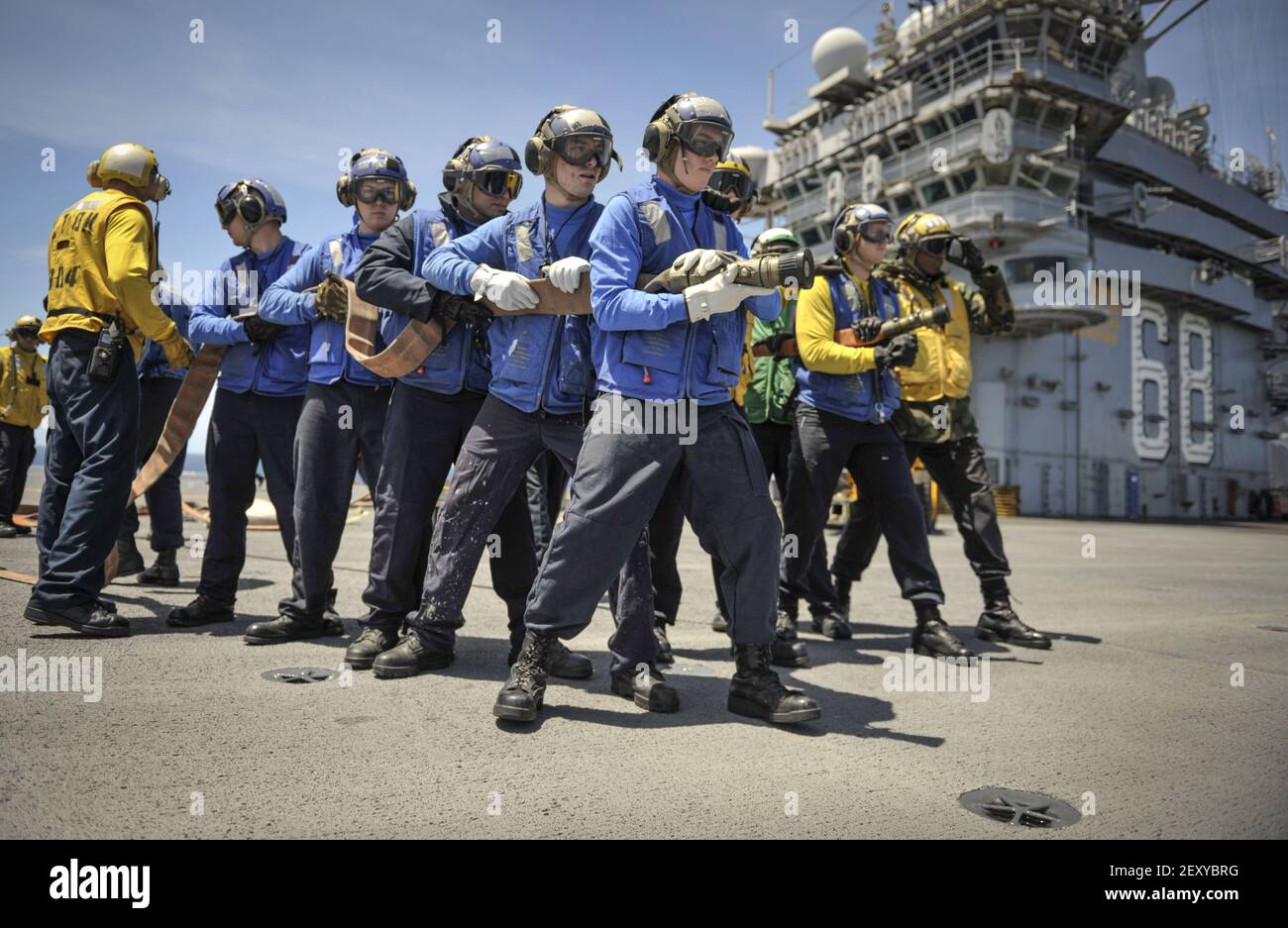 PACIFIC OCEAN (June 20, 2014) Sailors conduct a firefighting drill on the flight deck aboard the aircraft carrier USS Nimitz (CVN 68). Nimitz is underway performing routine operations and training exercises. (Photo by Mass Communication Specialist 3rd Class Aiyana S. Paschal/US Navy/Sipa USA) Stock Photo
