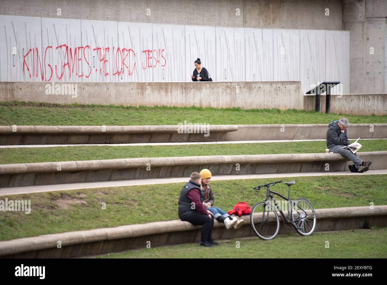 Edinburgh, Scotland, UK. 5th Mar, 2021. Pictured: Red spray paint graffiti covers the front wall of the Scottish Parliament which reads, “KING JAMES THE LORD JESUS” Credit: Colin Fisher/Alamy Live News Stock Photo