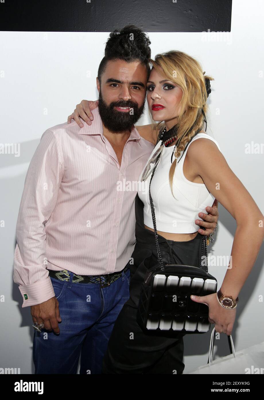 A.Z. Araujo and Andrea Salomone attend the A.Z. Araujo show during  Mercedes-Benz Fashion Week Swim 2015 at Oasis at the Raleigh on July 21,  2014 in Miami, Florida. ( Photo by Alberto
