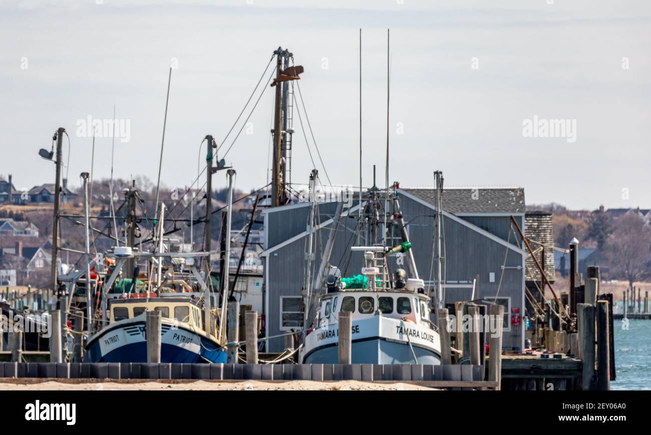 Landscape with fishing boats at the docks, Star Island, Montauk, NY Stock Photo