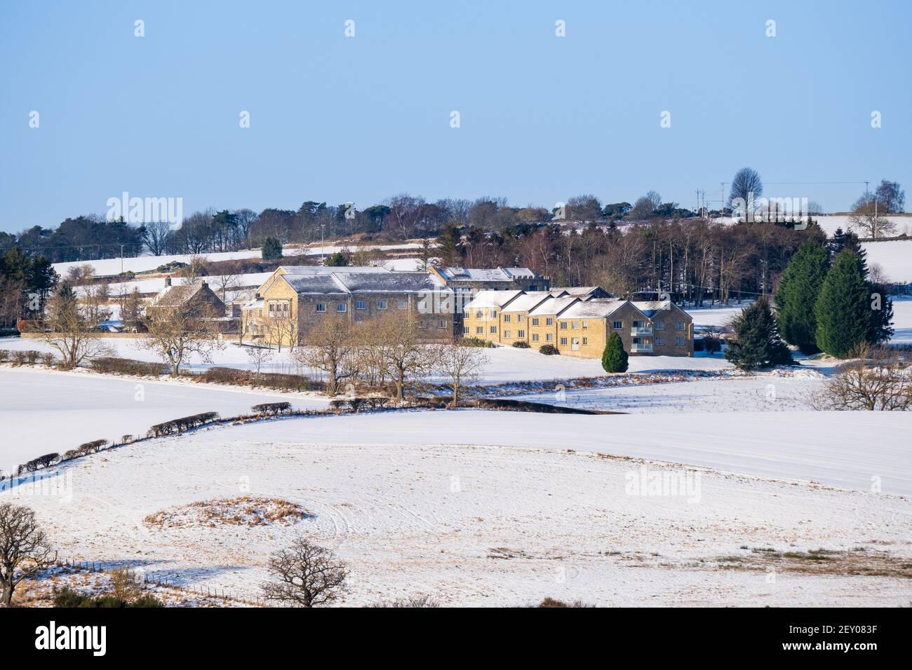 Winter view of Derwent Manor Hotel in snow countryside. This hotel lies just off the A68 near the border of County Durham and Northumberland Stock Photo
