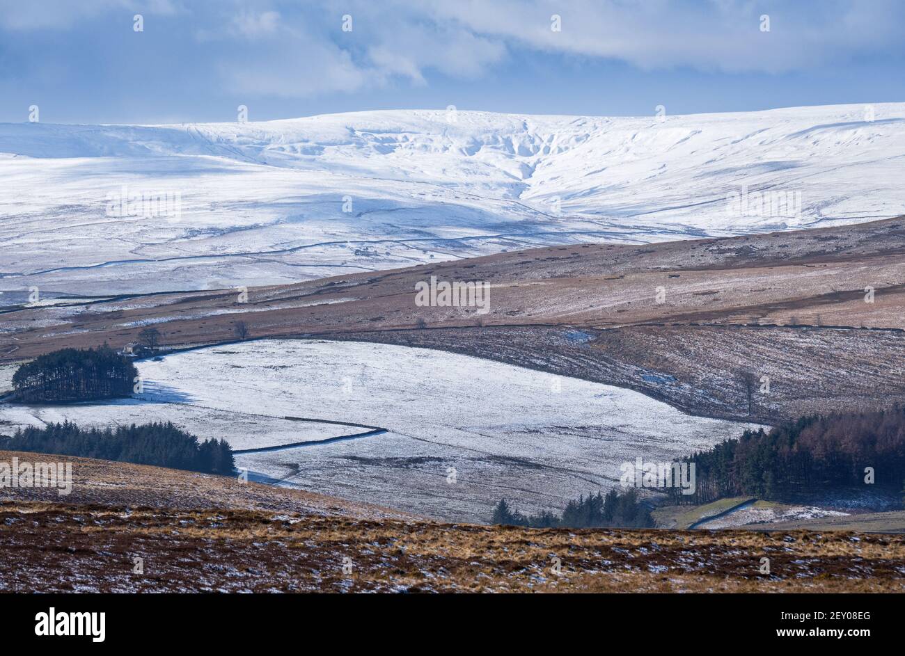 North Pennines above Weardale in winter looking towards snow covered  Fendrith Hill and Chapel Fell with ski tows on Swinhope Moor  Weardale Ski Club Stock Photo