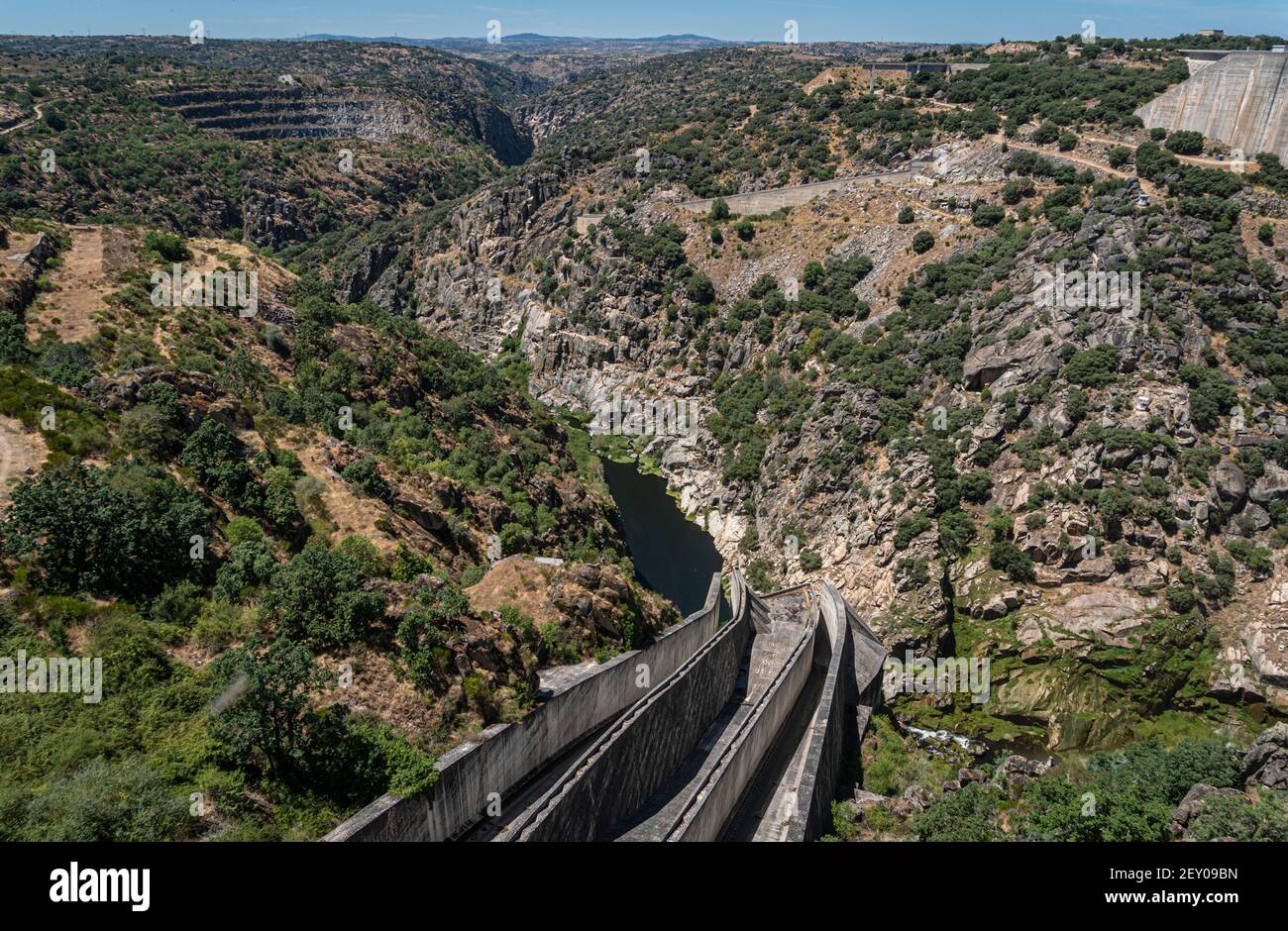 View across the valley from Almendra (Almond) Dam, also known as Villarino Dam, in Salamanca, Spain Stock Photo