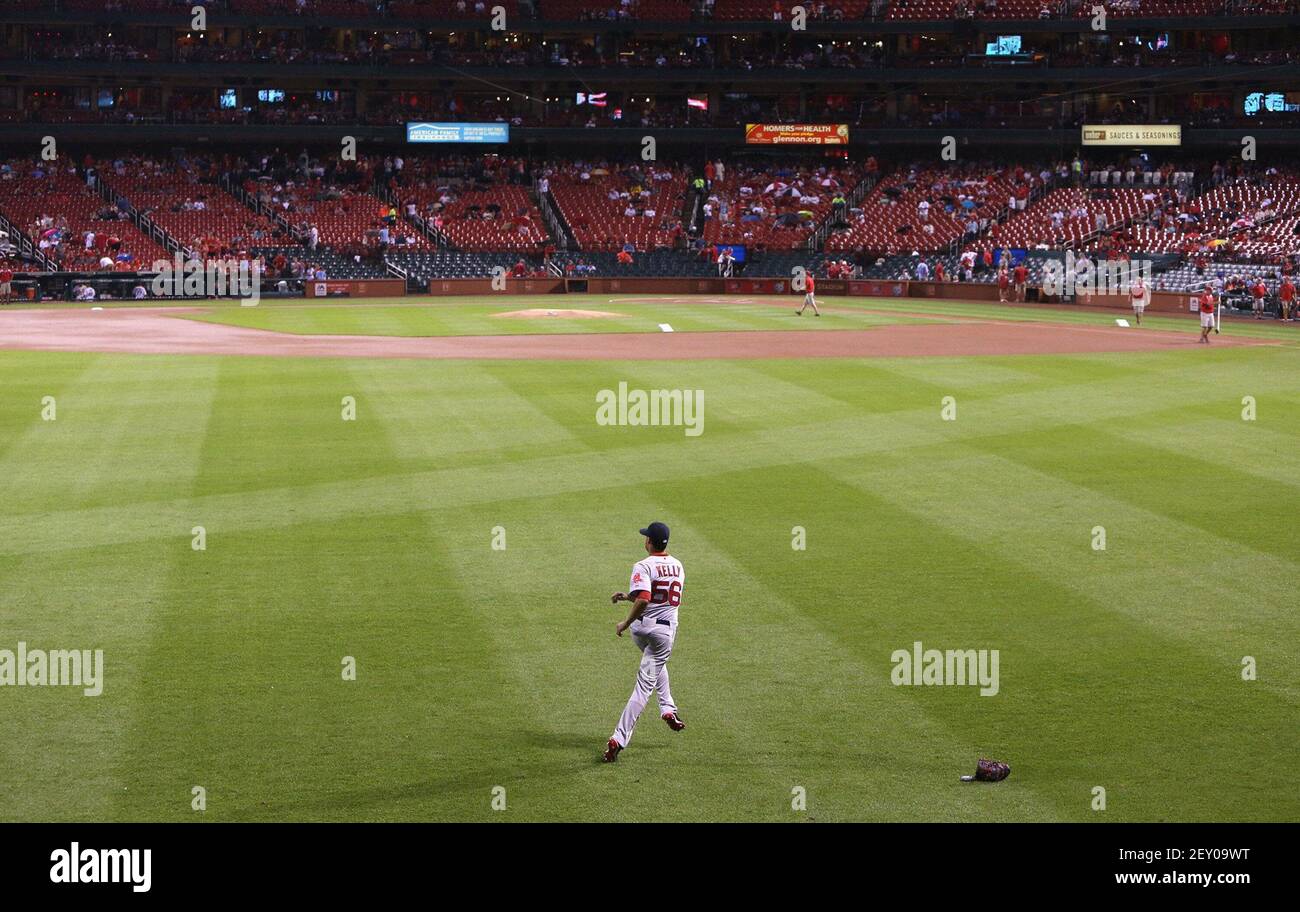 Boston Red Sox and former St. Louis Cardinals shortstop Edgar Renteria  acknowledges the standing ovation as he comes to bat in the first inning at  Busch Stadium in St. Louis on June