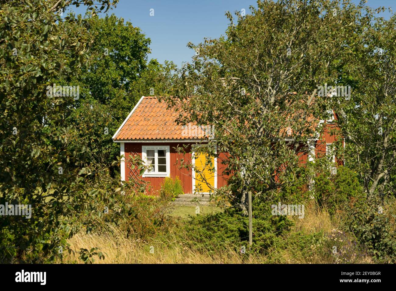 Red wooden house , Sweden Stock Photo
