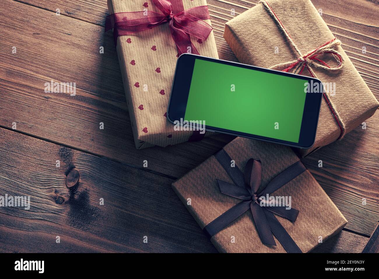 Smartphone and giftboxes Stock Photo