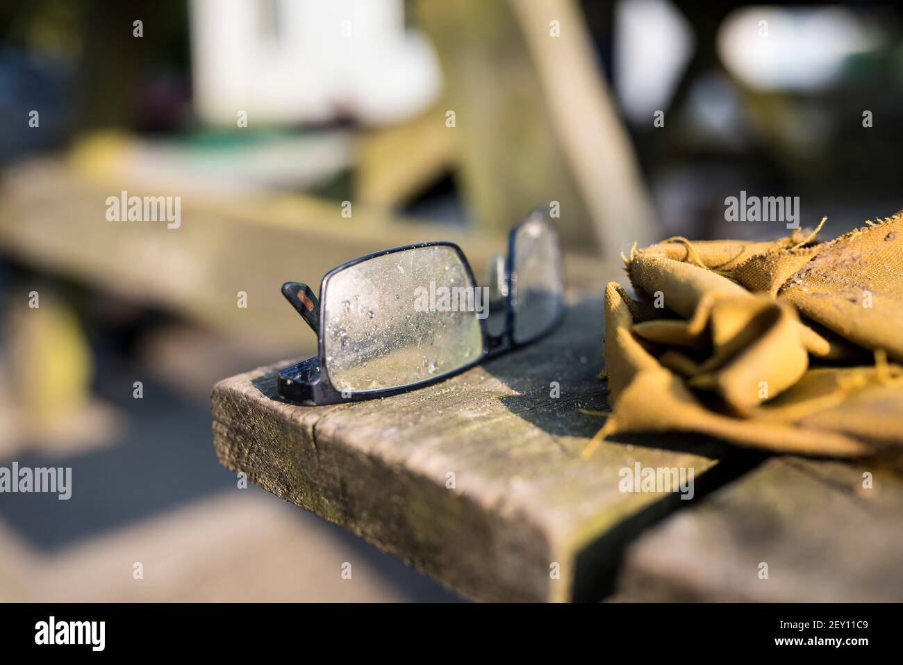 Glasses and gloves from a construction worker Stock Photo
