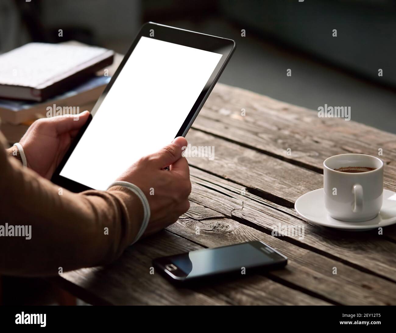 Tablet computer with isolated screen in male hands Stock Photo - Alamy