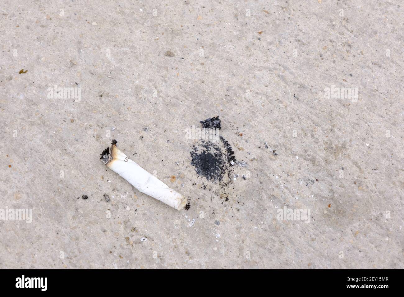 Cigarette ashes on the ground