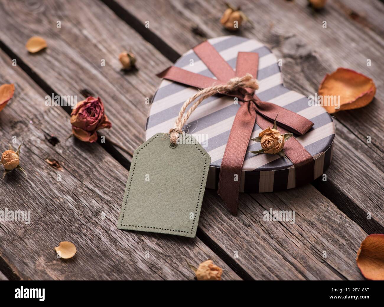 Gift tag and heart shaped gift box Stock Photo