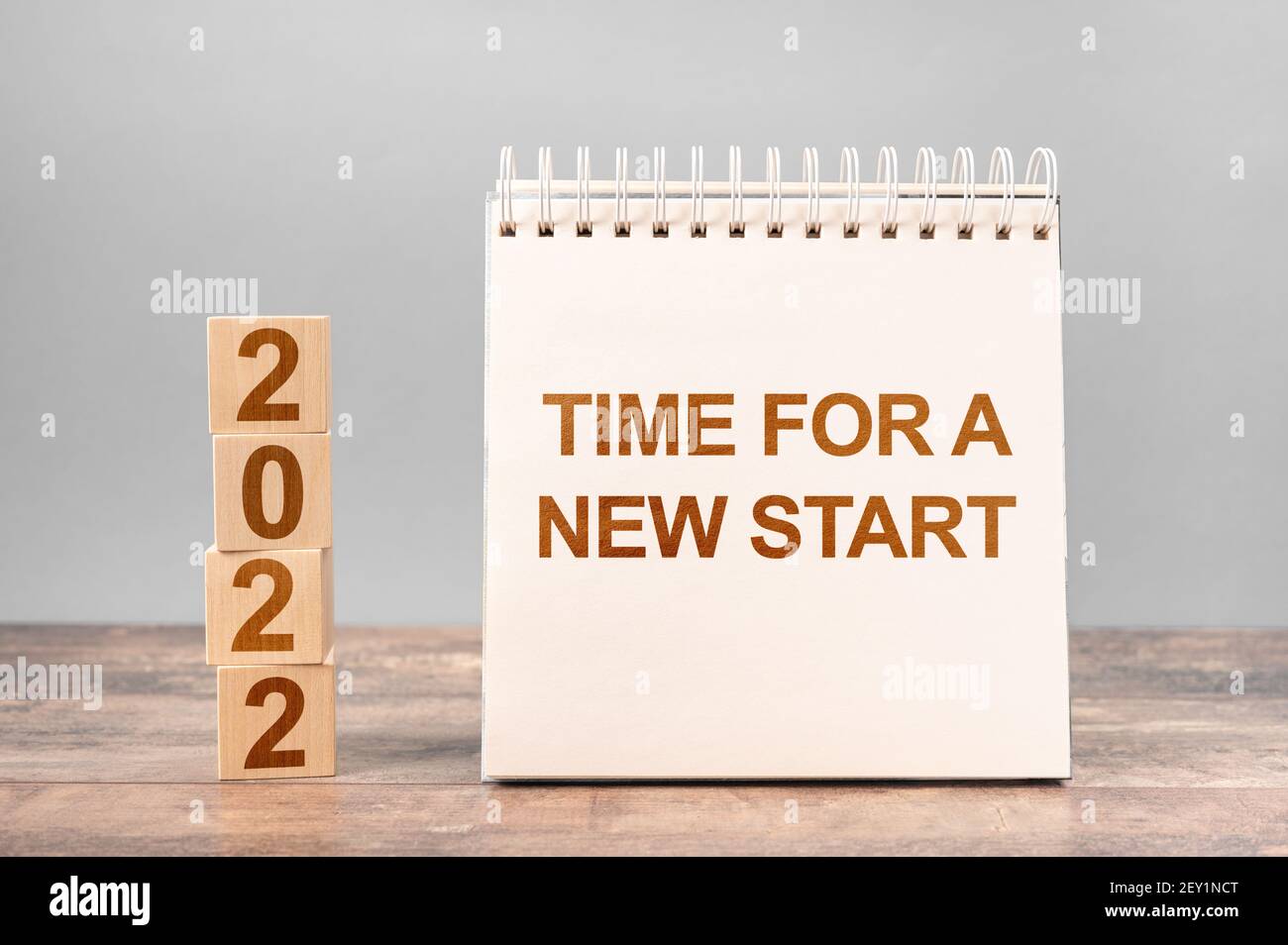 2022 time for a new start. Time for A New Start words and 2022 cubes wooden table background. New Year. startup concept Stock Photo