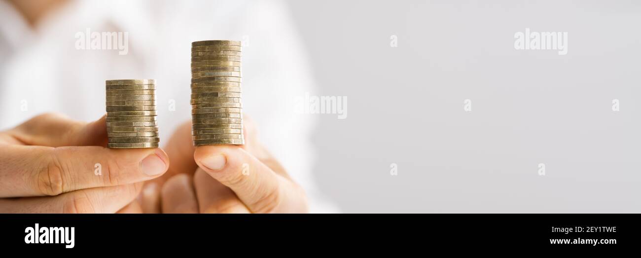 Compare Wage And Money Gap. Equal Pay Stock Photo