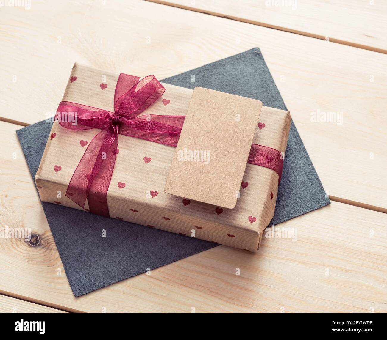 Gift box with blank tag. Stock Photo