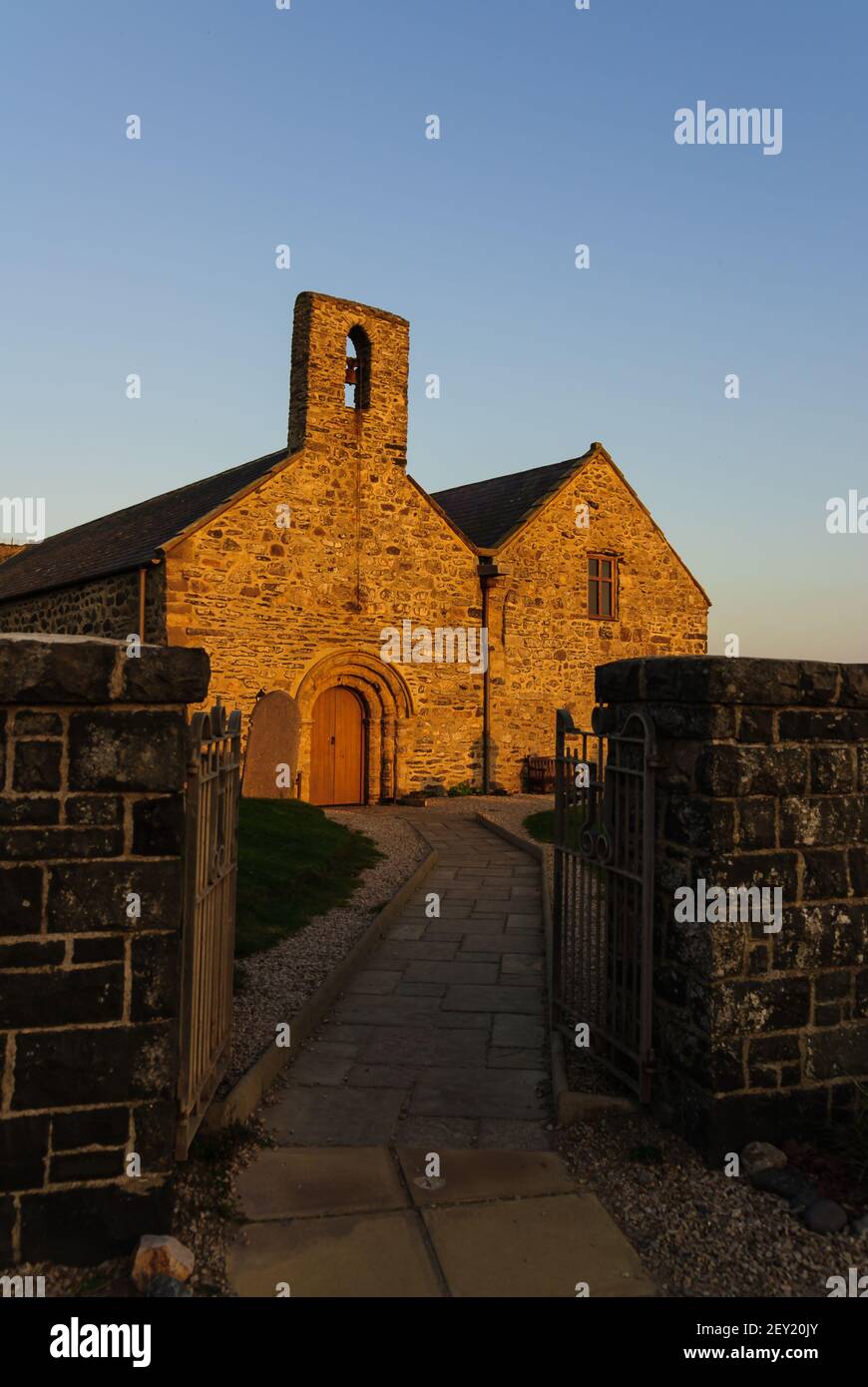 St Hywyn's church in the Welsh coastal village of Aberdaron, Gwynedd. Dating from the 12th century named after St Hywyn an early Welsh Saint Stock Photo