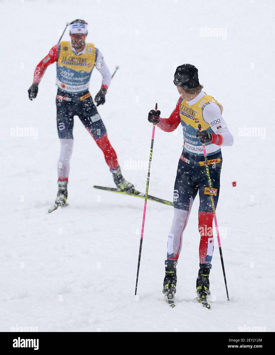 Oberstdorf, Germany. 05th Mar, 2021. Nordic skiing: World Championships, cross-country - relay 4 x 10 km, men. Hans Christer Holund from Norway changes to Johannes Hoesflot Klaebo (r) from Norway. Credit: Karl-Josef Hildenbrand/dpa/Alamy Live News Stock Photo