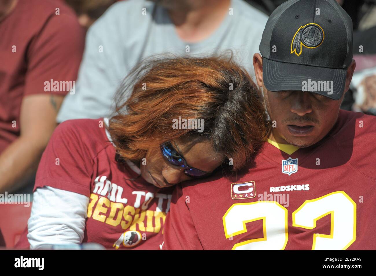 SEP 14, 2014 Two Redskin fans are passed out during the game in the front row of seats during the season opening matchup between the Jacksonville Jaguars and the Washington Redskins