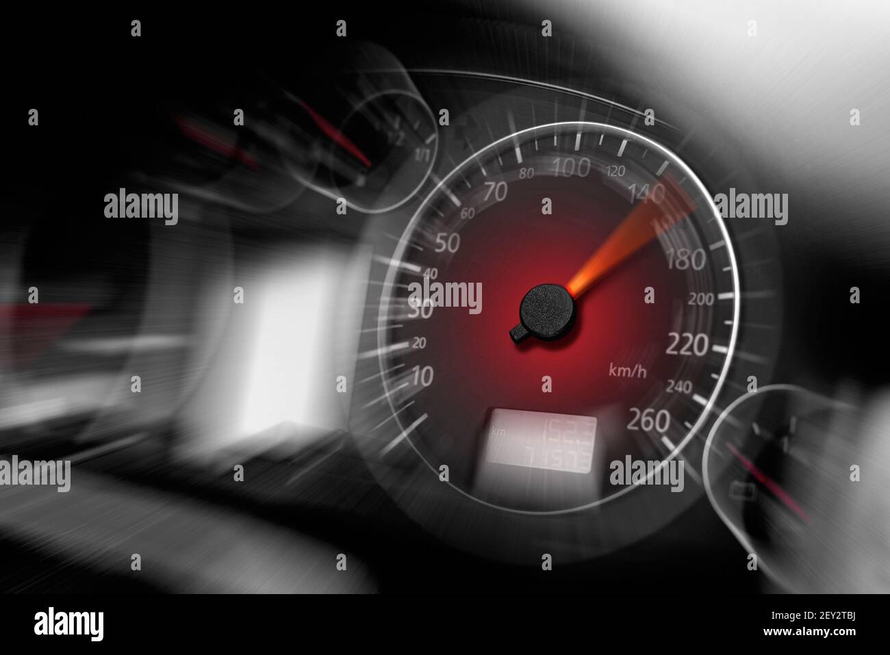 The speedometer of a modern car shows a high driving speed Stock Photo