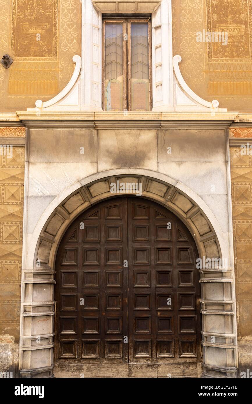 ancient arched wooden house door Monza Italy Europe Stock Photo