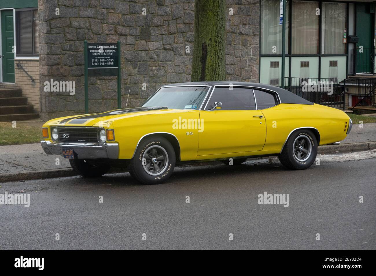 A yellow & black Chevy Chevelle Super Sport that appears to  be refurbished. Parked in Whitestone, Queens, New York City. Stock Photo